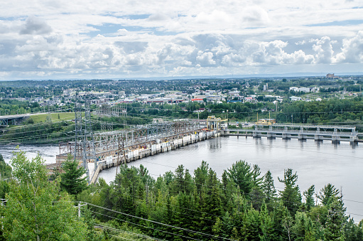 Aerial view of hydro electric dam and power station in Alma during summer day