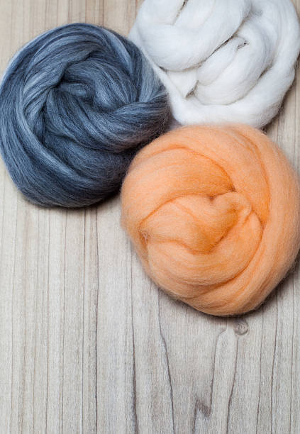 istock Grey, White, Apricot Felting Wool 162819203