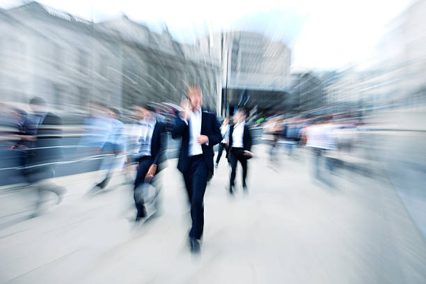istock Crowd of Business People, Businessman Using Mobile Phone, Blurred Motion 162819868
