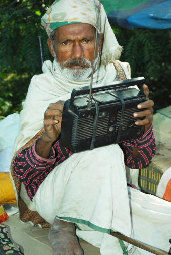Old Man enjoying the Radio