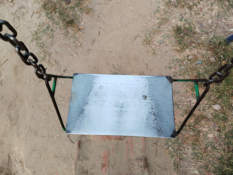 Playground swing in a park made by Indian government