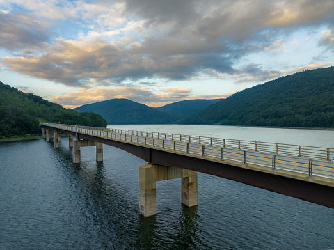 Late afternoon summer aerial photo of the bridge over the Cannonsville Reservoir, Trout Creek, Route 10.