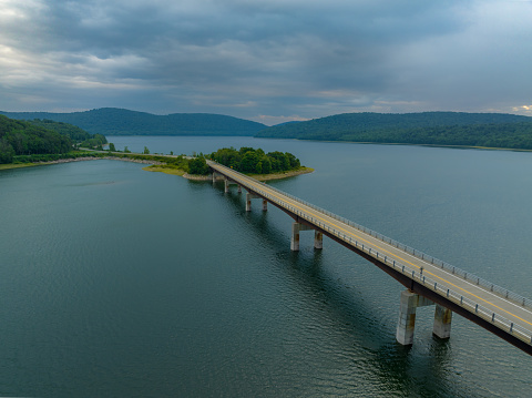 Late afternoon summer aerial photo of the bridge over the Cannonsville Reservoir, Trout Creek, Route 10.