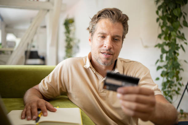 istock Man doing online shopping 1628282460