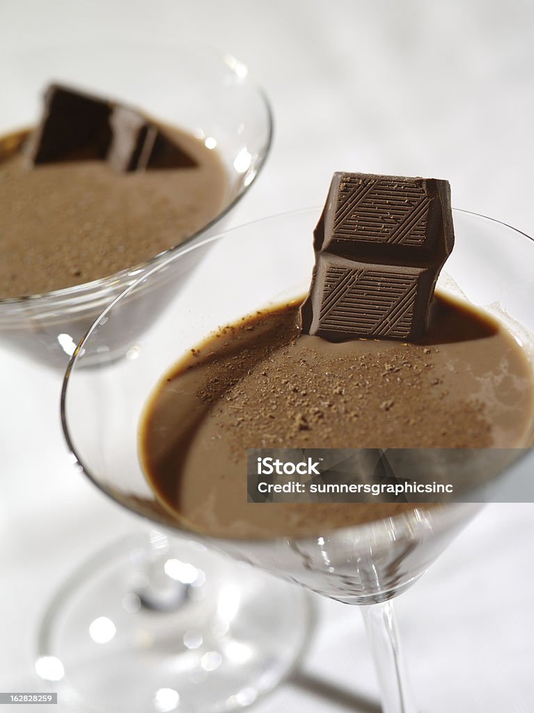 Chocolate martini Photo of two chocolate martinis with a very shallow depth of field, focus on the chocolate garnish. Martini Stock Photo