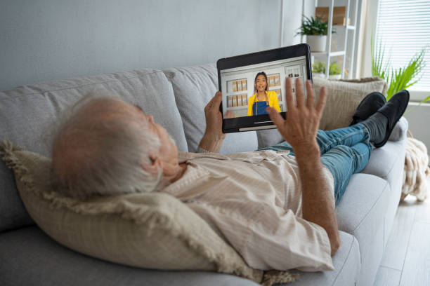 istock Senior man having online call with daughter. 1628291781