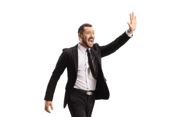 istock Businessman running and waving with hand 1628317511
