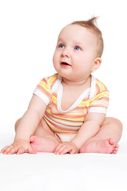 istock Cute baby sitting isolated. 162833661