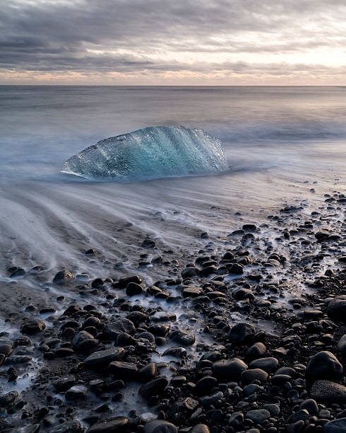 istock Iceberg on beach at sunset, Jokulsarlon, Iceland 162834867