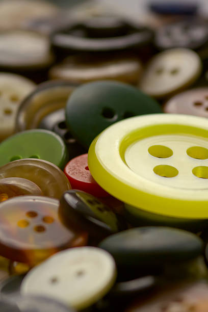 The big yellow plastic button. stock photo