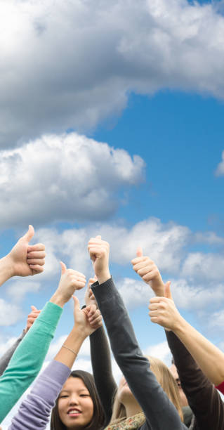 istock Multiracial adult - thumbs up 162835606