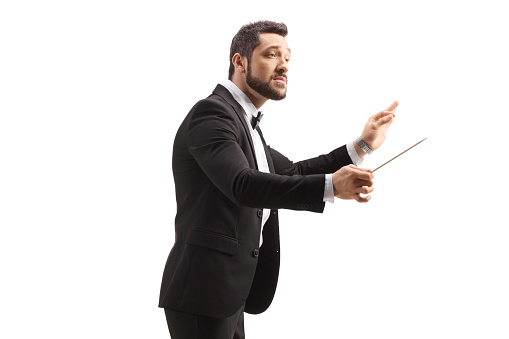Music conductor directing a performance isolated on white background