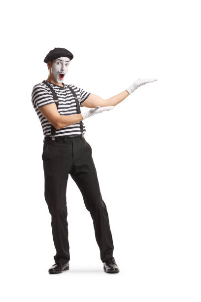 istock Full length portrait of a mime presenting 1628372078