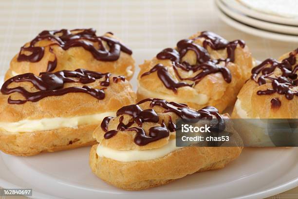 Chocolate Eclairs Stock Photo - Download Image Now - Baked Pastry Item, Brown, Chocolate