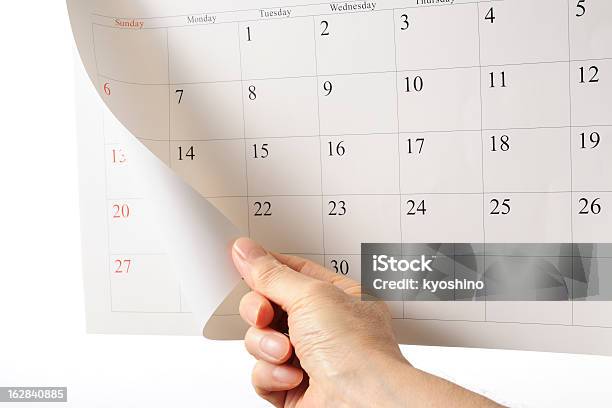 ハンド Overturns カレンダーシートの背景に白色 - カレンダーのストックフォトや画像を多数ご用意 - カレンダー, 回転する, 人間の手