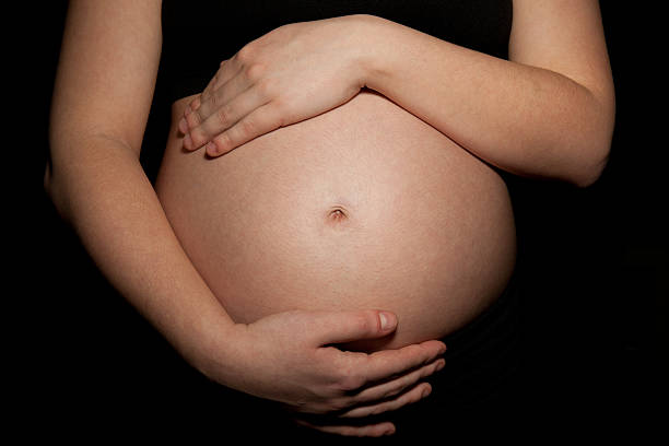 Pregnant girl's Belly stock photo