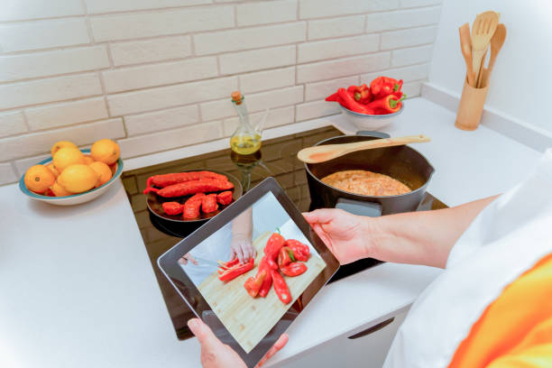 istock woman cooking in her kitchen 1628577359