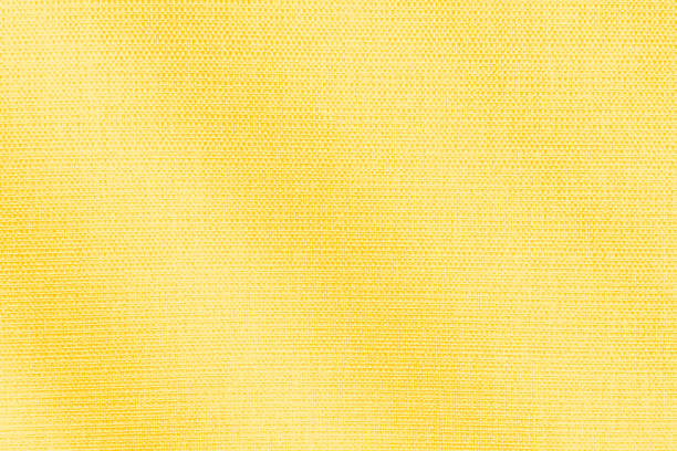 istock light brown fabric, orange, gold, yellow . gradient Luxurious golden luxury background 1628580491