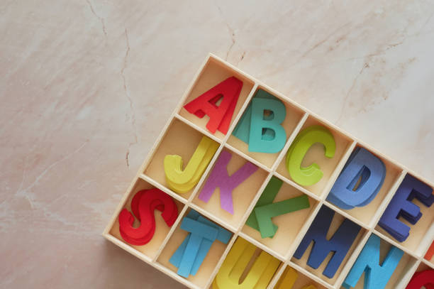 Colorful the wooden English alphabet toy stock photo