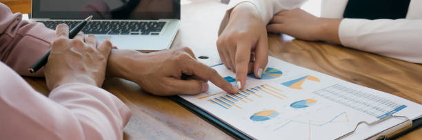 istock Team leader coach teach young workers explain on paper for business plan listen talkative coworker and discussing new project presentation Serious professional advisor consulting 1628613498