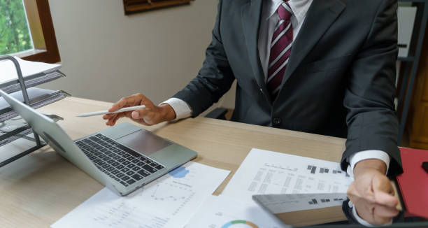 istock Business man working with laptop. Young business man thinking Concentrated at work. 1628613510