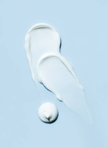istock cosmetic smears cream texture on blue background 1628656956