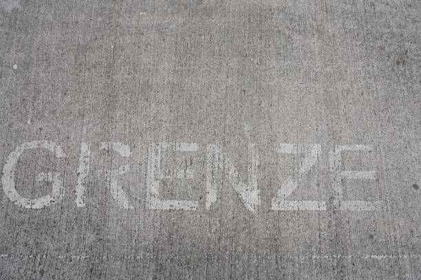 istock Border on a gray background. Lettering border on a concrete surface 1628697336