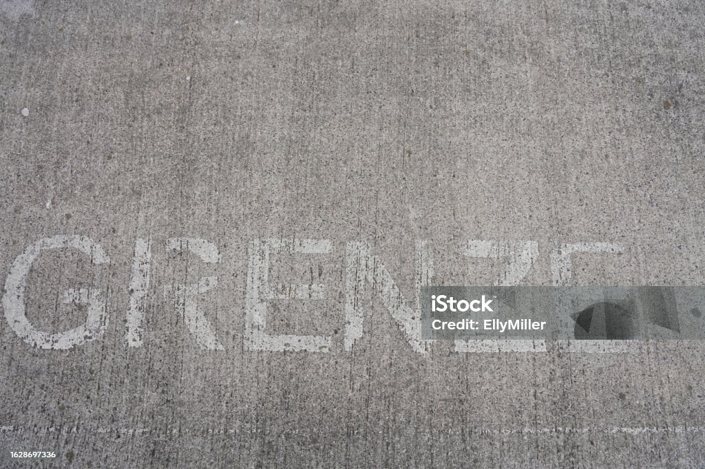 Border on a gray background. Lettering border on a concrete surface Abstract Stock Photo