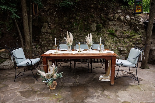 Dinning table decorated for garden party without people