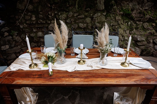 Dinning table decorated for garden party without people