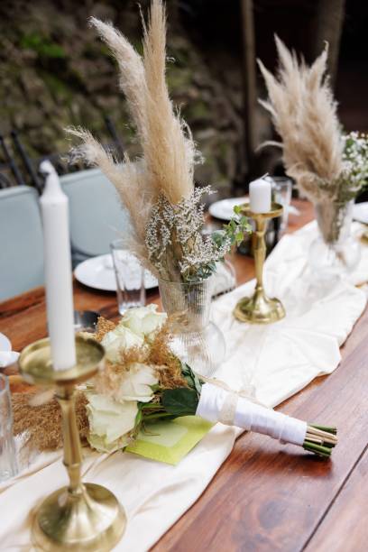 istock Dinning table decorated for garden party without people 1628711298