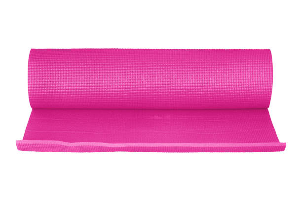 istock Pink yoga mat isolated on white background with clipping path. 1628731763