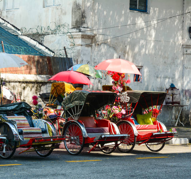 Georgetown, Malaysia - Mar 10, 2016. Rickshaw on the main streets in historical Georgetown, Penang, Malaysia.