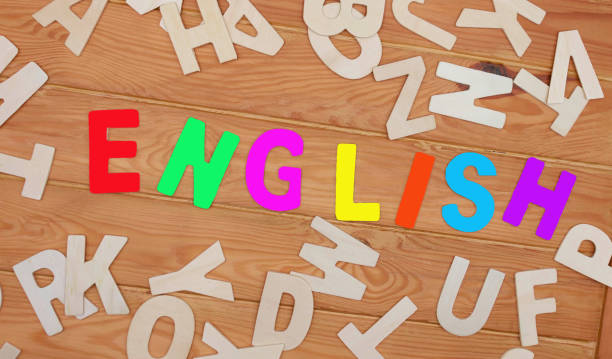 English wood alphabets on wooden table