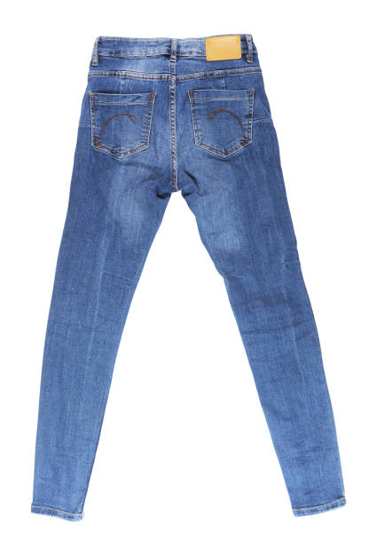 Close up top view of denim jeans trouser put on grunge rustic wooden table background