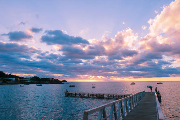 istock Dramatic View to the Wooden Pier in the Sunset light 1628783613