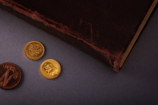 istock Numismatics. Old collectible coins on the table. Top view. Copy space for your text 1628791134