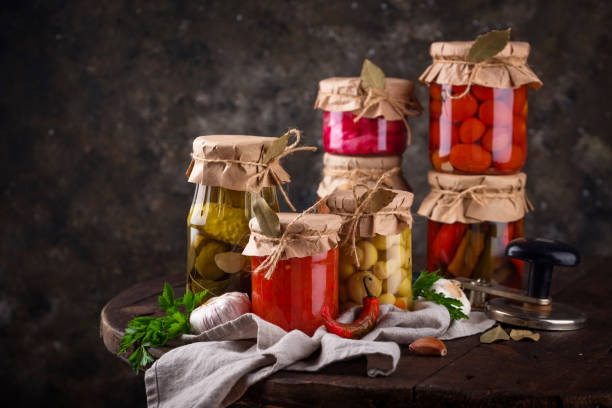 istock Pickled vegetables in glass jars. 1628837706