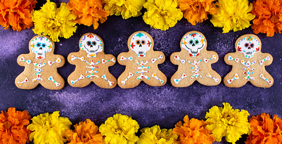 Day of the Dead cookies in shape of sugar skull. Mexican Halloween Dia de los Muertos