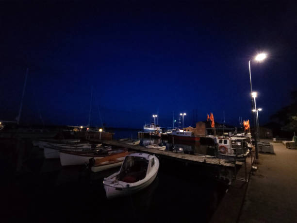 istock Summer night at the harbor 1628863809