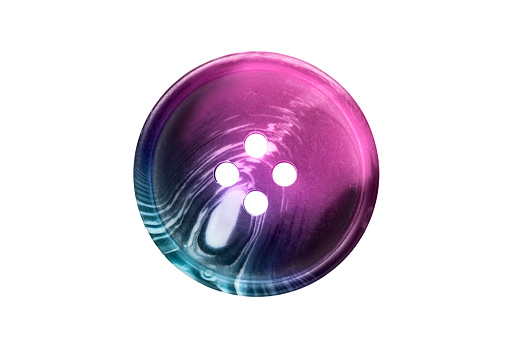 Colorful purple and blue clothes button isolated over white