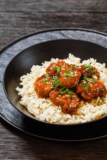istock Baked Honey Sesame Chicken with brown rice 1628880100