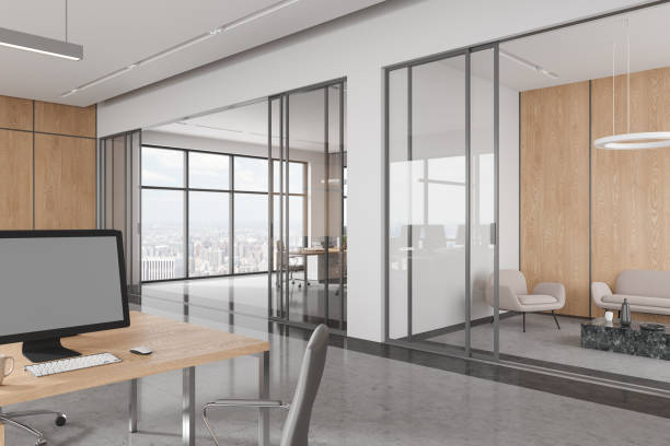 istock Modern business interior with work and relax place, glass doors and window 1628889474