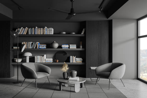 istock Grey living room interior with bookshelf and armchairs, panoramic window 1628895117