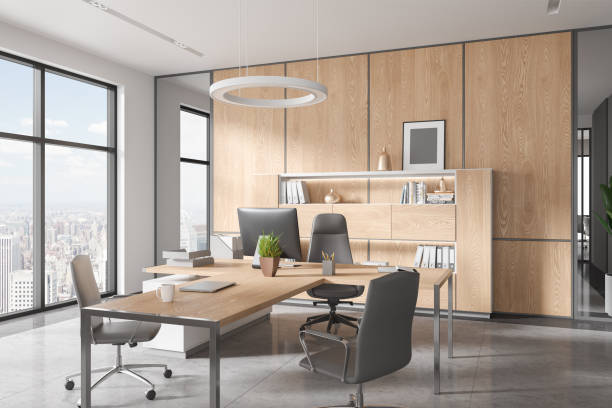 istock Wooden office interior with consulting zone and armchairs, panoramic window 1628897859