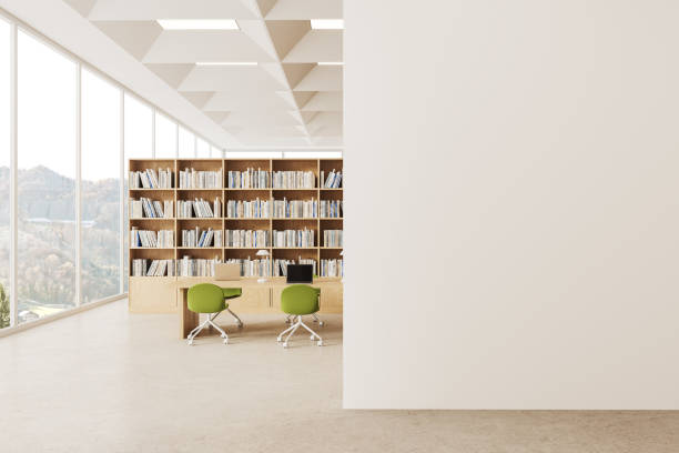 istock White public library reading room interior with table and blank wall 1628898967