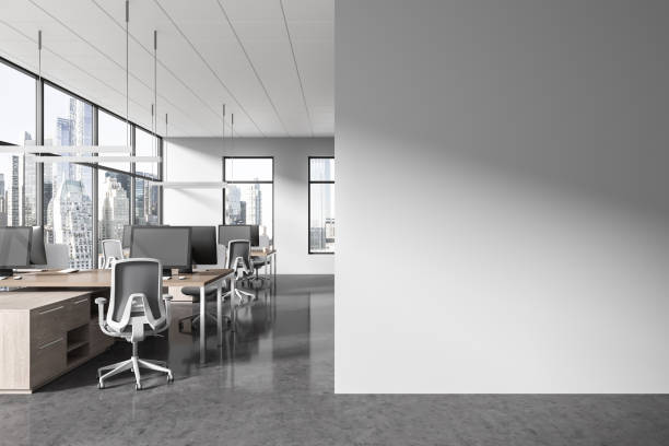 istock Modern workplace interior with seats and desk near panoramic window. Mock up 1628905525