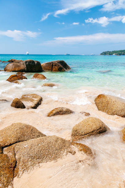 istock Tropical Beach with Clear Blue Water and Rocks in Phuket. 1628926894
