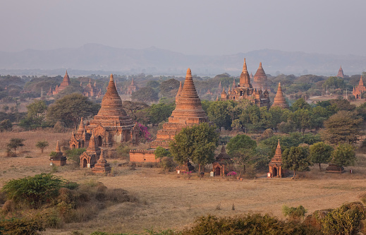 Aerial view of Buddhist temples at sunrise in Bagan, Myanmar. Bagan is one of the world greatest archeological sites, a sight to rival Machu Picchu or Angkor Wat.