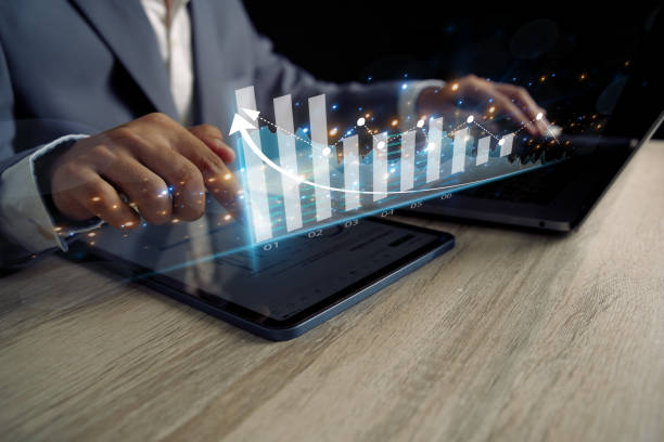 istock concept of long-term business development and management Executives looking at virtual screens business graph icon Goal setting, problem-solving, workflows, optimal business operations, and innovation. 1628949608